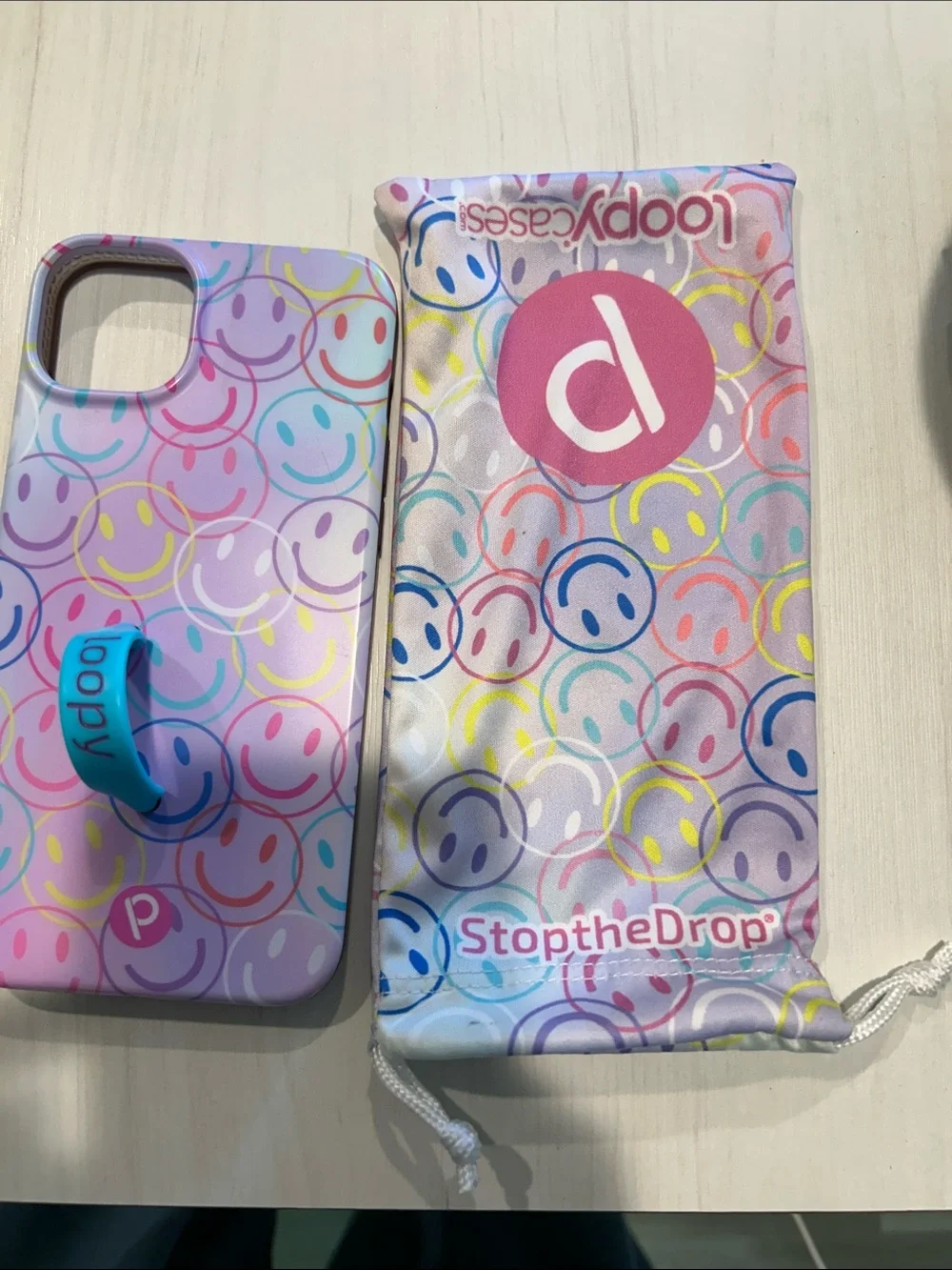 Loopy Case Pink Multicolor Smiley Phone Case with Blue Loop (St. Jude collection